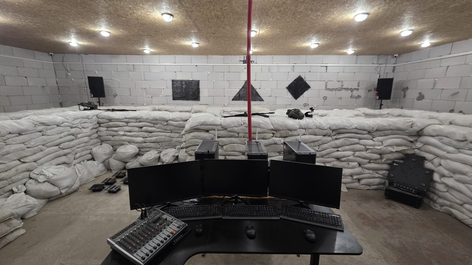 Ironframe Systems VR training facility — operator station overlooking training bay