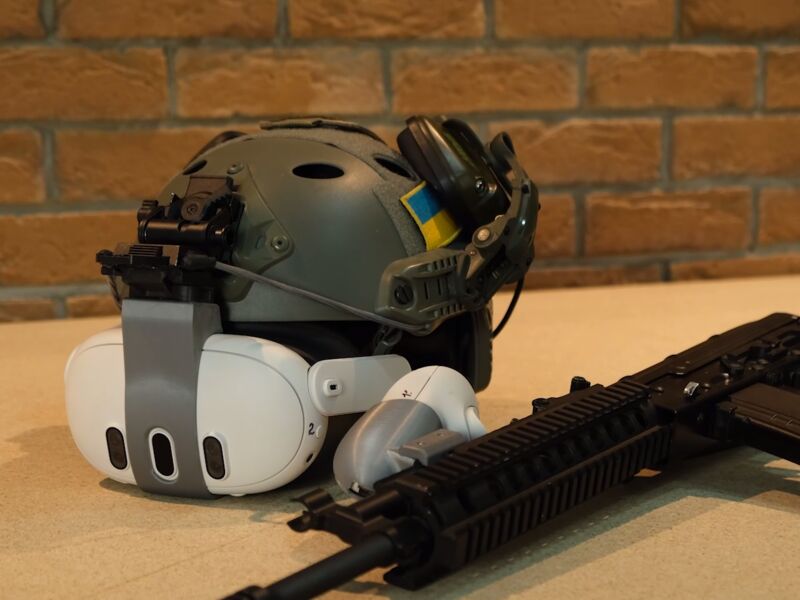 Trainee kit — tactical helmet with VR headset and training replica rifle